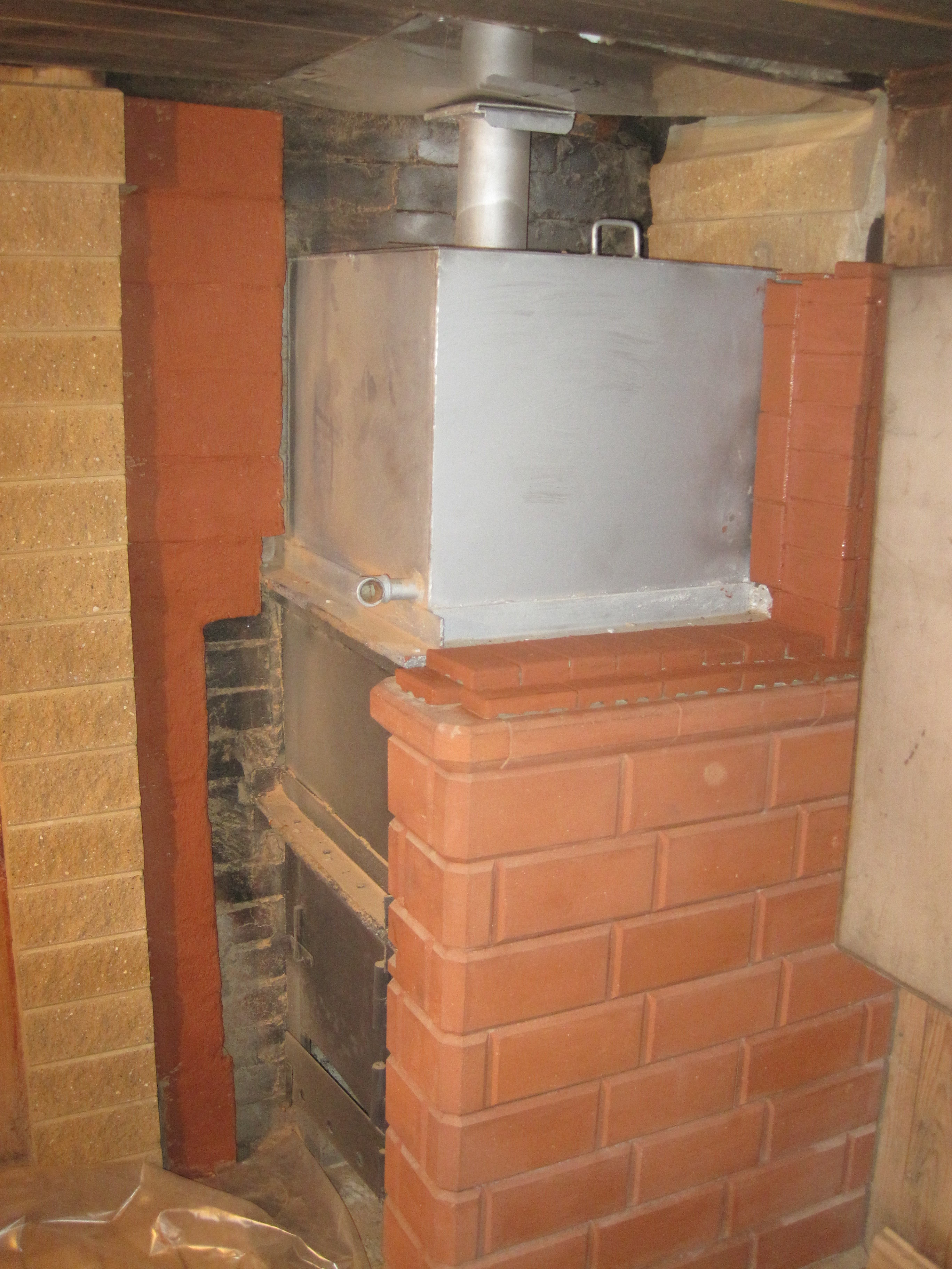 Готовая печь для дома под обкладку кирпичом