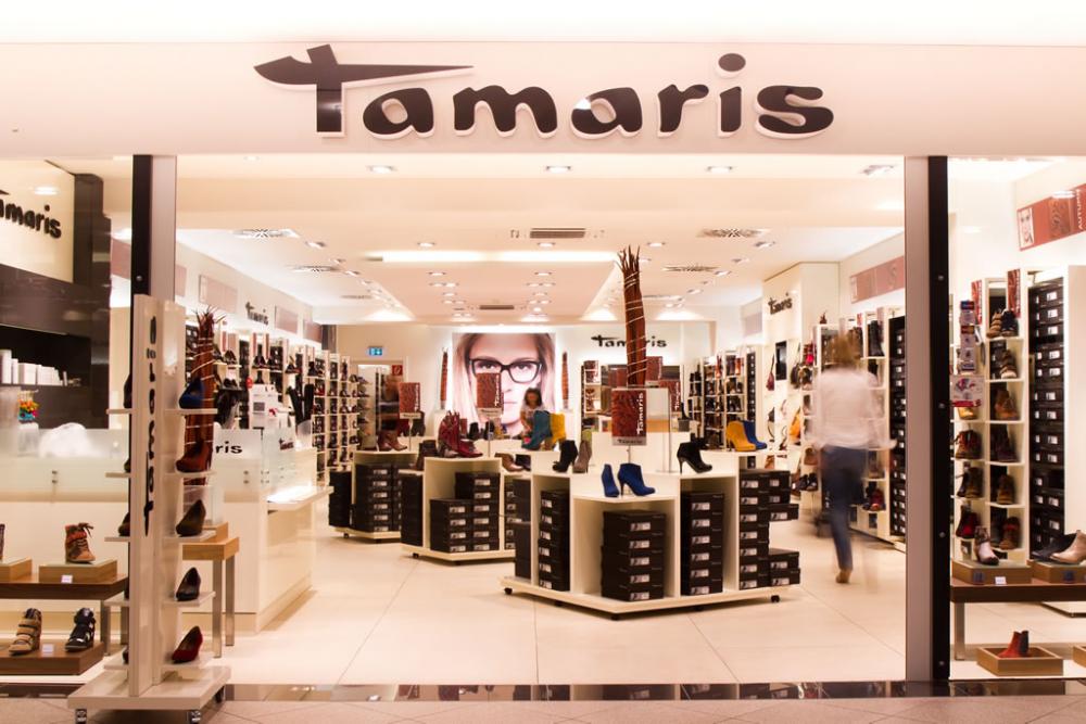 Обувные магазины в тц. Tamaris бренд. Магазин обуви. Фирменный магазин обуви. Магазин брендовой обуви.