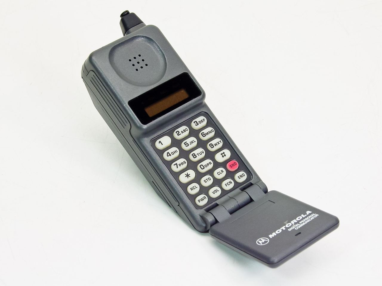 Мобильный телефон а 12. Motorola MICROTAC DPC 550. Motorola MICROTAC 8900. Motorola MICROTAC 9800x. Моторола дампс 1997.